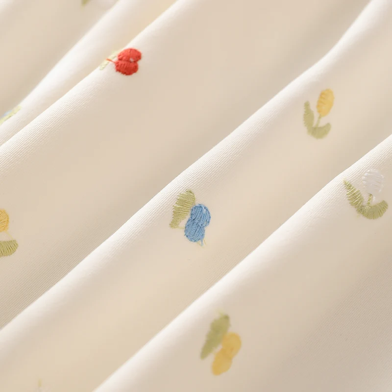 Tablecloth with embroidered mini flower pattern and ruffled edge Stornfield
