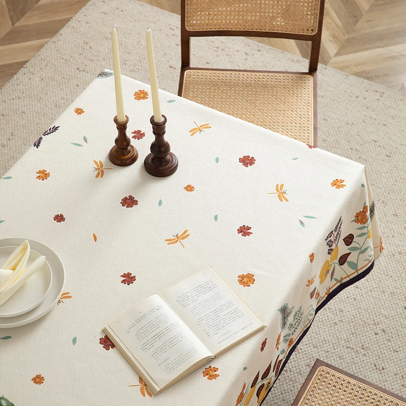 Tablecloth made of cotton blend with floral border illustration and reinforced hem Stornfield