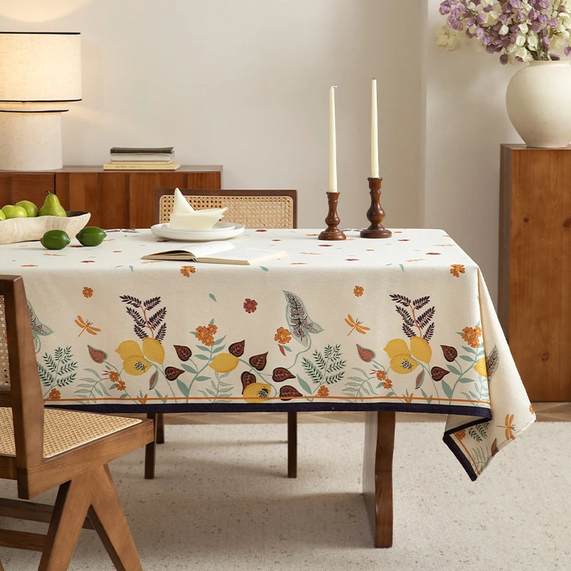 Tablecloth made of cotton blend with floral border illustration and reinforced hem Stornfield
