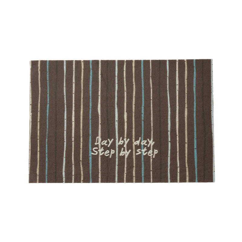 Durable entrance doormat with striped texture and "Welcome" lettering Stornfield