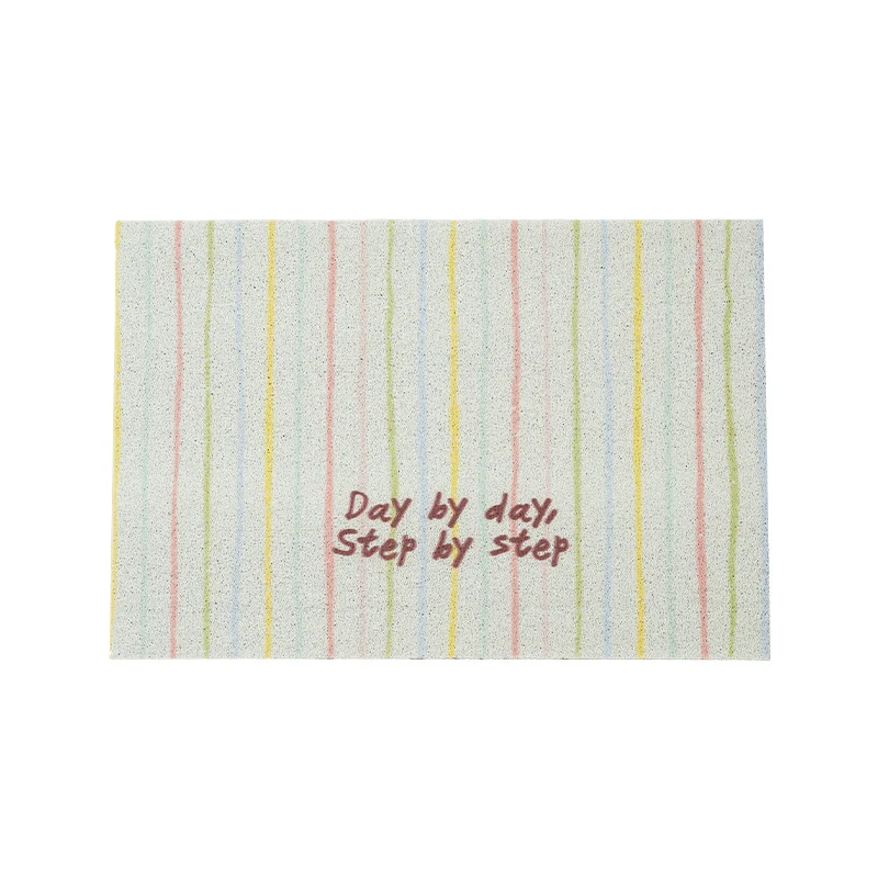 Durable entrance doormat with striped texture and "Welcome" lettering Stornfield
