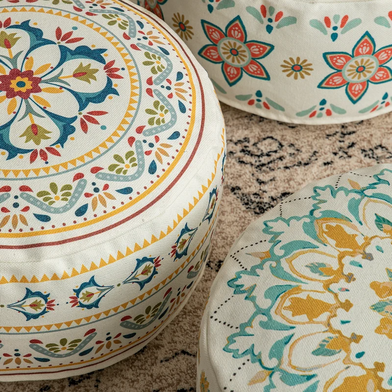 Round seat pouf with woven cotton cover and ethnic mandala print Stornfield