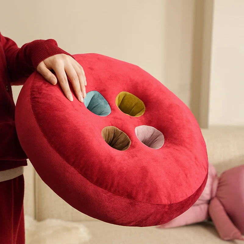 Round floor cushion pouf in button design with four recessed compartments and soft velvet cover Stornfield