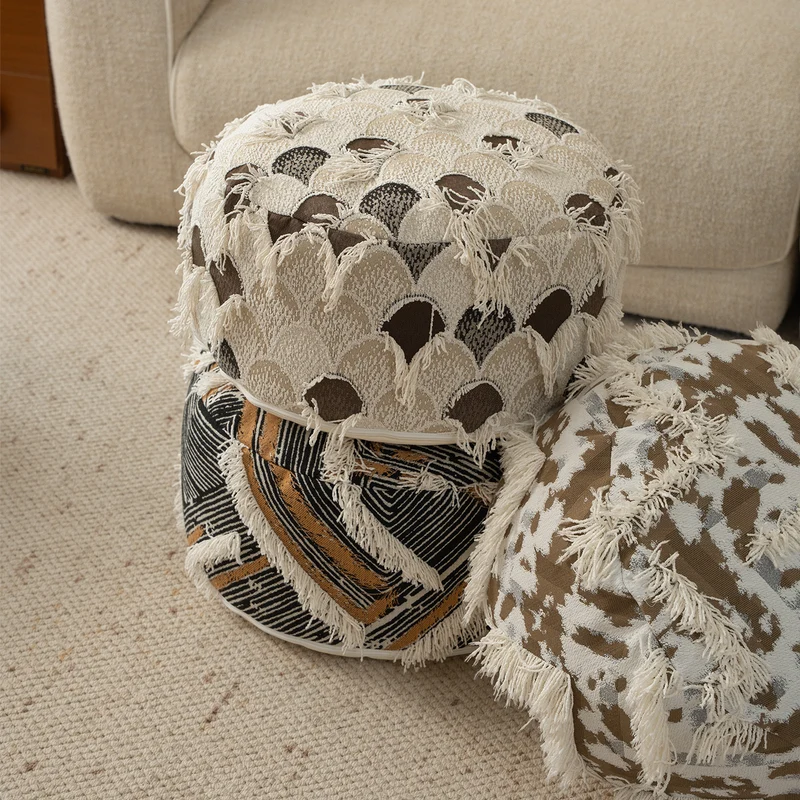 Round Boho Seat Pouf with Hand-Tufted Structure and Decorative Fringes Stornfield