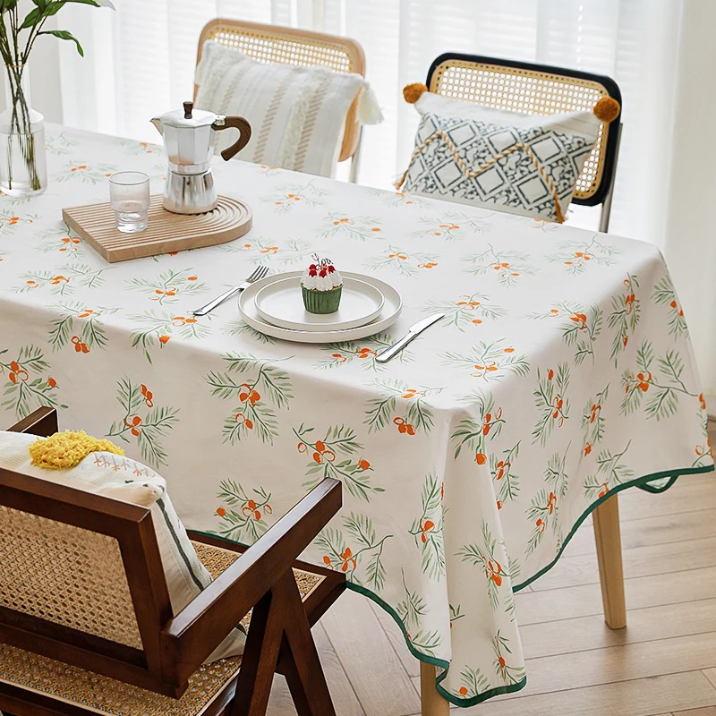 Rectangular tablecloth with botanical orange berry print and contrasting hem piping Stornfield