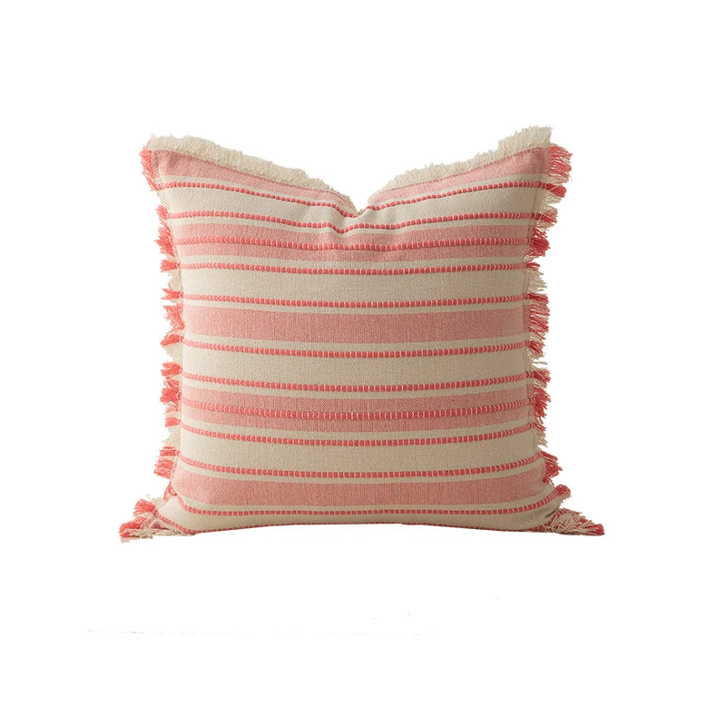 Square cushion cover made of hand-woven cotton blend with decorative fringe trim Stornfield