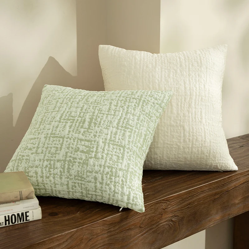 Square, quilted decorative pillow with woven texture Stornfield
