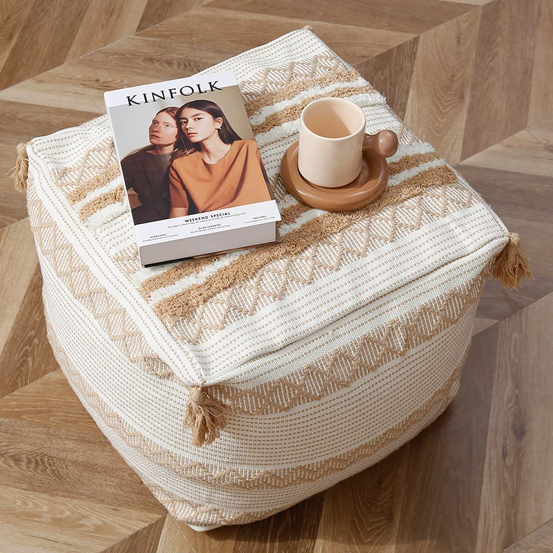 Square Boho seat pouf made of woven cotton blend with tassels and removable cover Stornfield