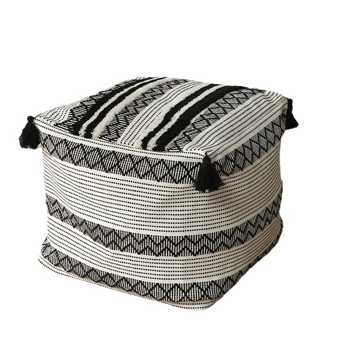 Square Boho seat pouf made of woven cotton blend with tassels and removable cover Stornfield