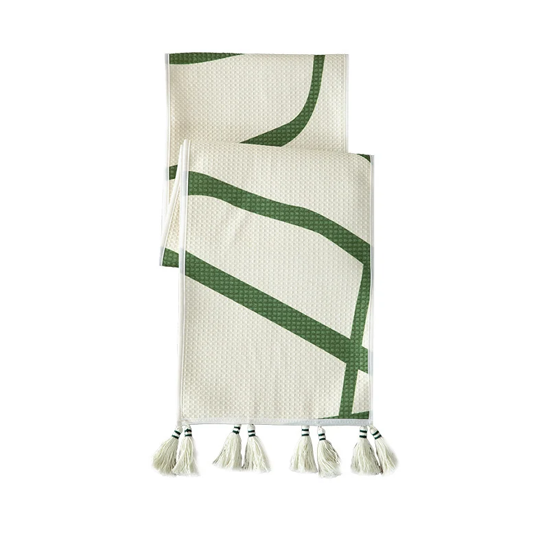 Light waffle beach towel with tassels and geometric jacquard pattern Stornfield