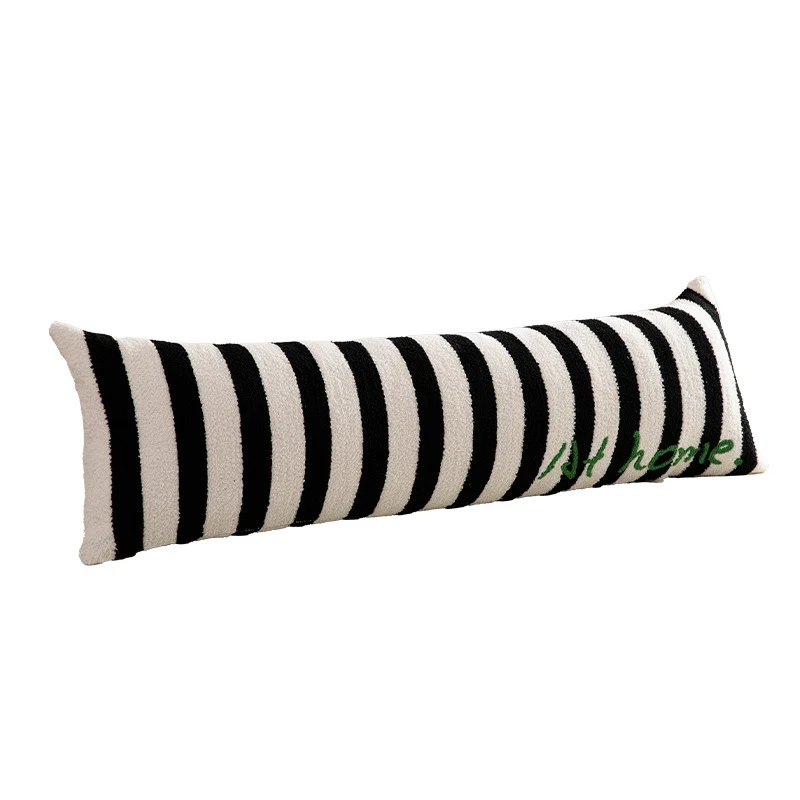 Elongated bench and windowsill cushion with nautical stripe texture and embroidered lettering Stornfield