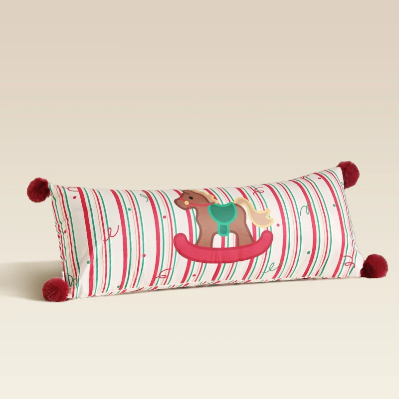 Long decorative lumbar and neck pillow in Christmas check with pompom and dog-tree motif Stornfield