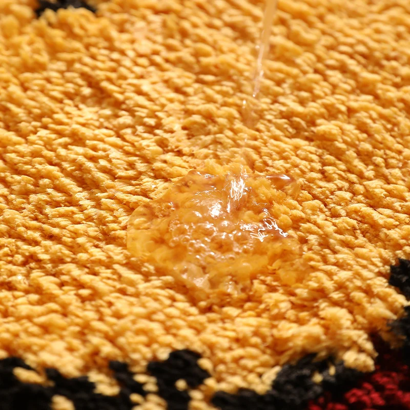Cat-shaped doormat with tufted chenille surface and non-slip underside Stornfield