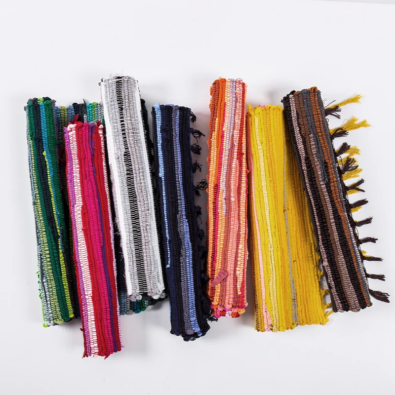 Handwoven cotton runner with colorful stripes and fringes Stornfield