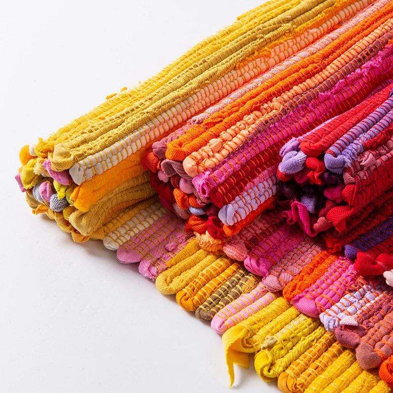 Handwoven cotton runner with colorful stripes and fringes Stornfield