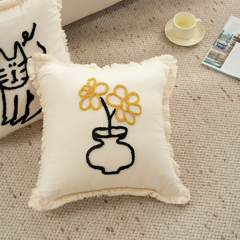 Woven decorative pillow cover with embroidered café motif and decorative fringe edge Stornfield