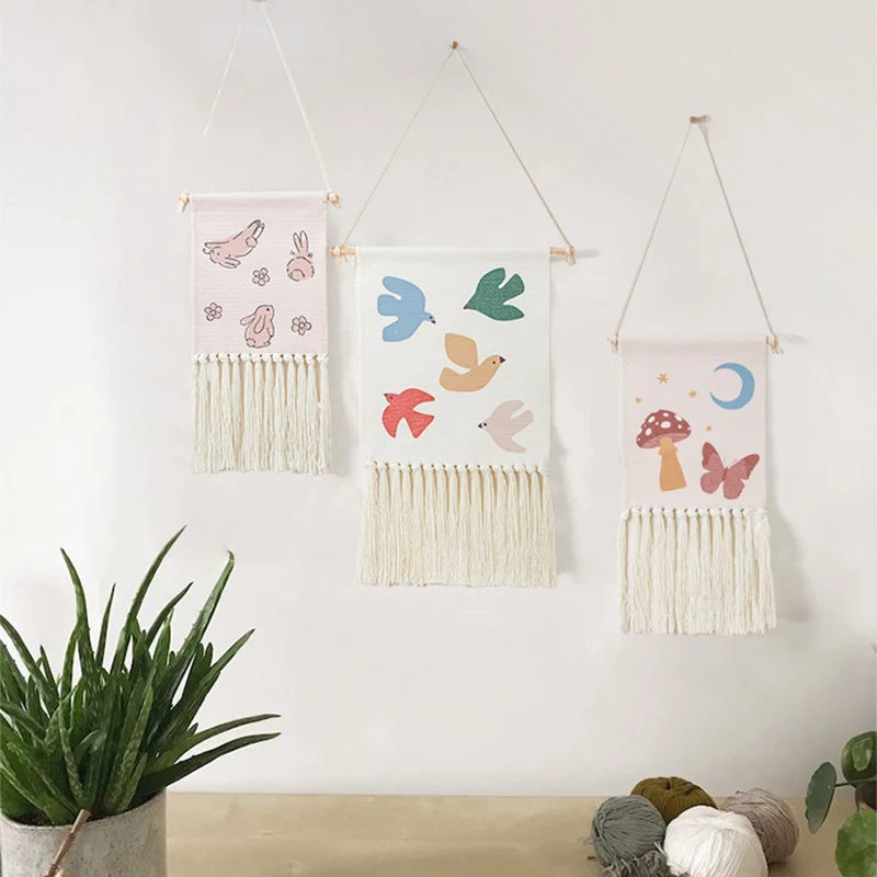 woven wall hanging with fringes and rabbit motif Stornfield