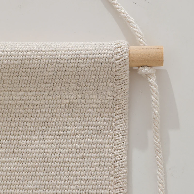woven wall hanging with fringes and rabbit motif Stornfield