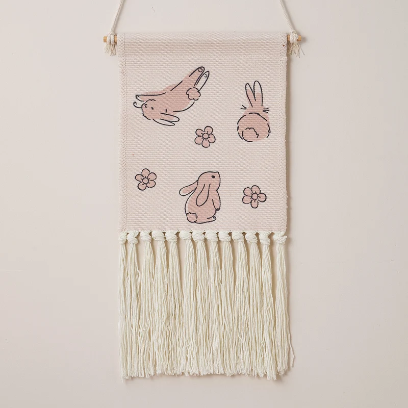 woven wall hanging with fringes and rabbit motif Stornfield