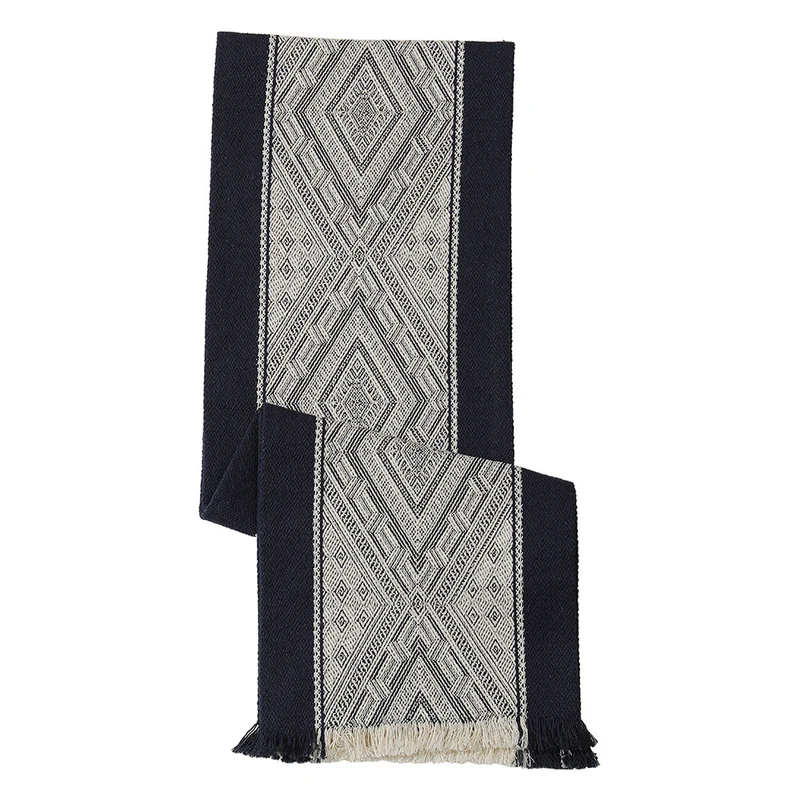 Woven table runner with geometric ethnic ornament and fringes Stornfield