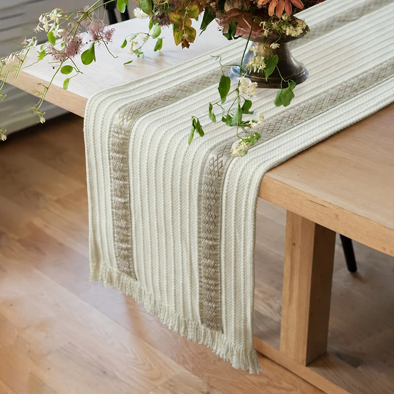 Woven table runner made of cotton blend with textured waffle weave and contrasting center strip Stornfield