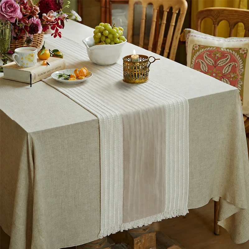 Woven table runner made of cotton blend with textured waffle weave and contrasting center strip Stornfield