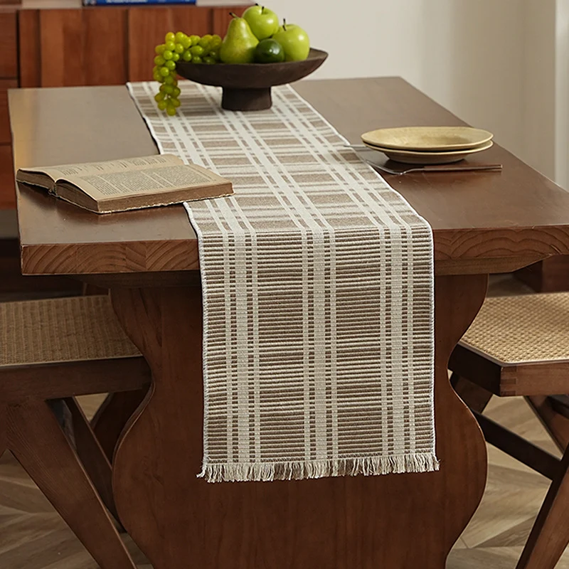 Woven table runner made of cotton blend with textured waffle weave and contrasting center strip Stornfield