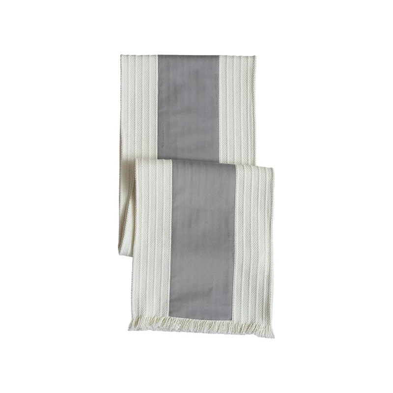 Woven table runner made of cotton blend with textured waffle weave and contrasting center strip Stornfield