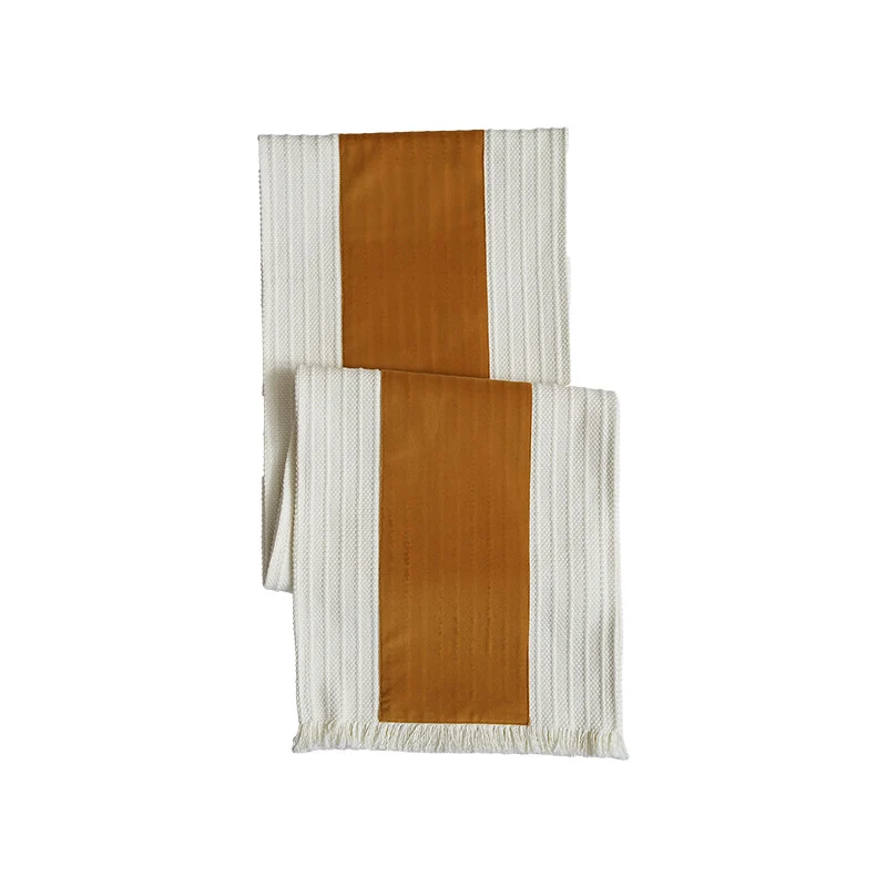 Woven table runner made of cotton blend with textured waffle weave and contrasting center strip Stornfield