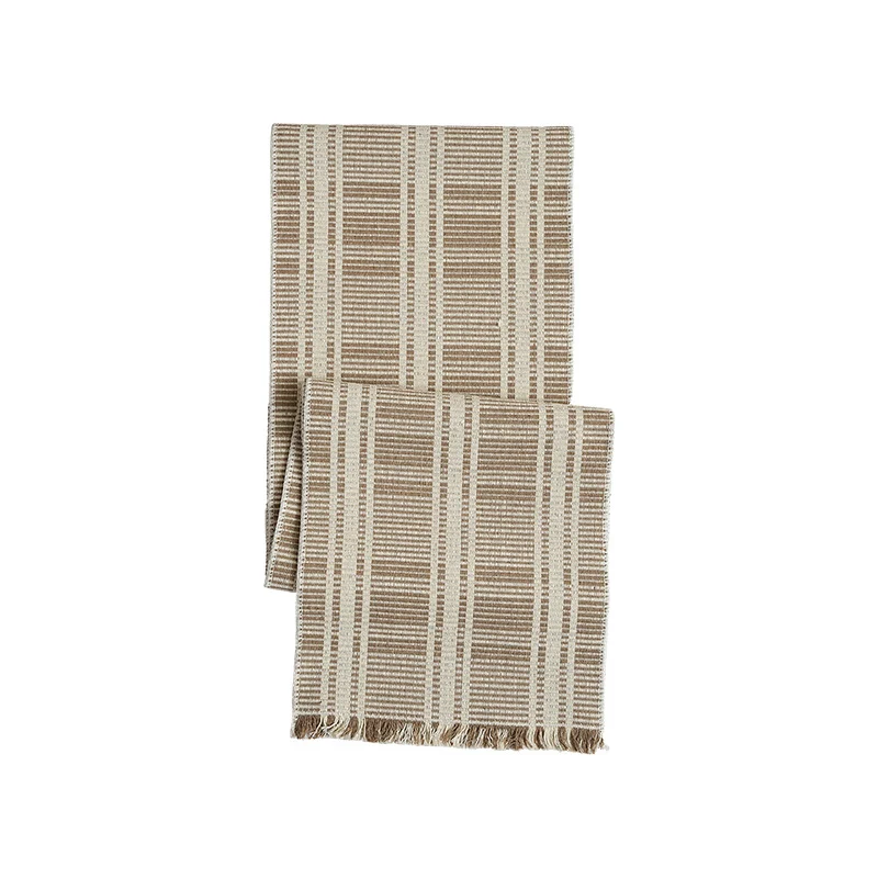 Woven table runner made of cotton blend with textured waffle weave and contrasting center strip Stornfield