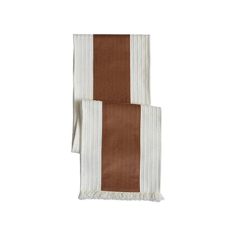 Woven table runner made of cotton blend with textured waffle weave and contrasting center strip Stornfield