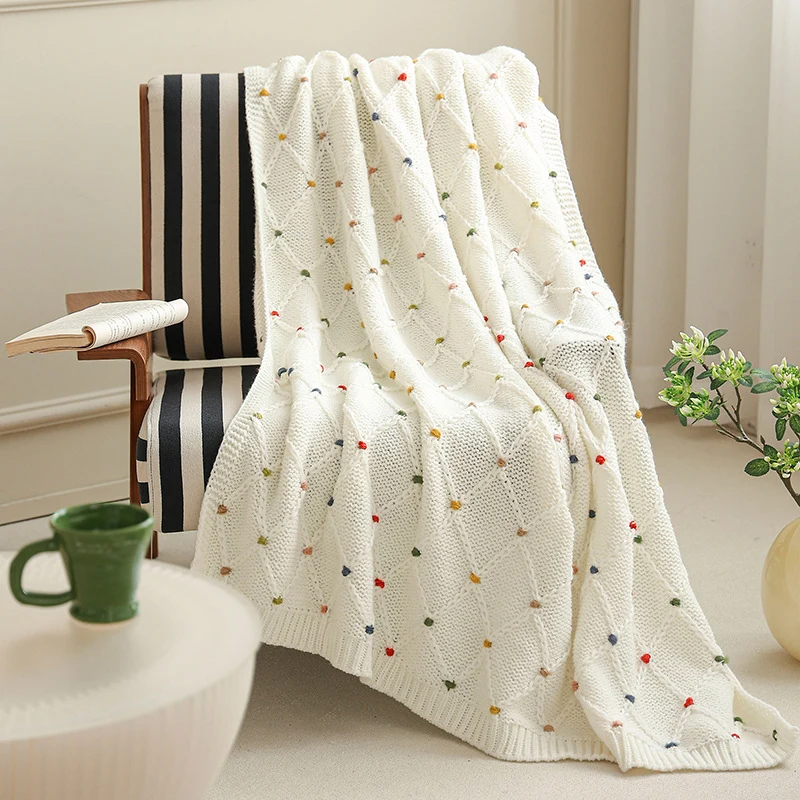 Knitted baby blanket made of cotton blend with diamond pattern and colorful stitch points Stornfield