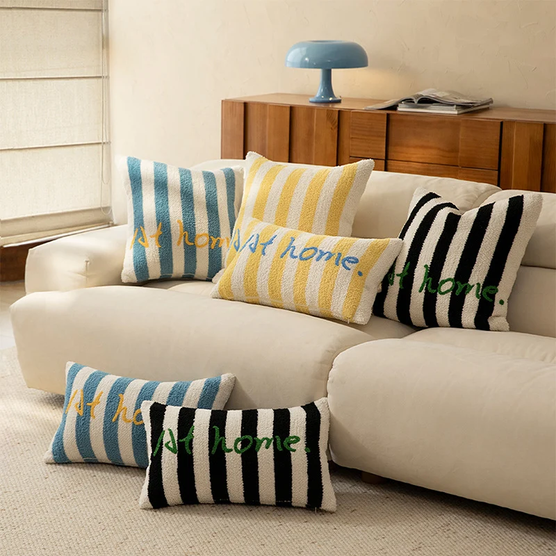 Striped bouclé decorative pillow with embossed loop structure and lettering embroidery Stornfield