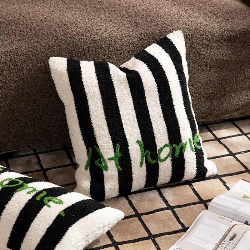 Striped bouclé decorative pillow with embossed loop structure and lettering embroidery Stornfield