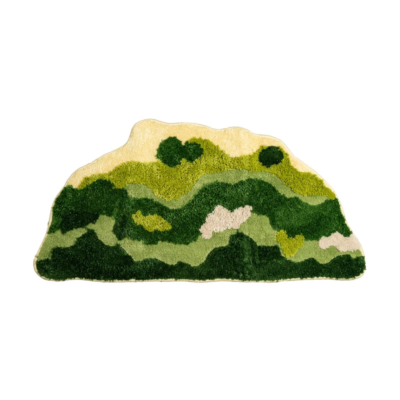 Shaped hand-tufted living room rug with moss-like structure and relief optics Stornfield