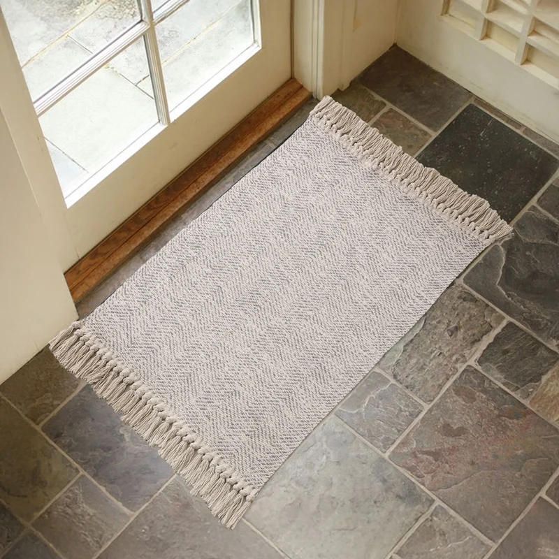 Braided runner rug with herringbone pattern and fringe edge Stornfield