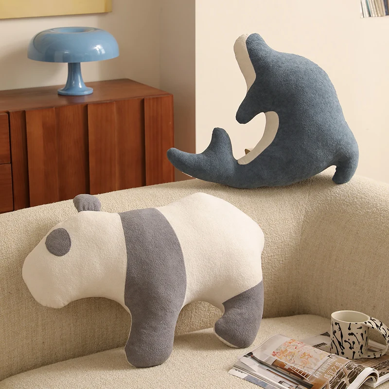 Dolphin-shaped comfort cuddle pillow made of soft plush with ergonomic contour Stornfield