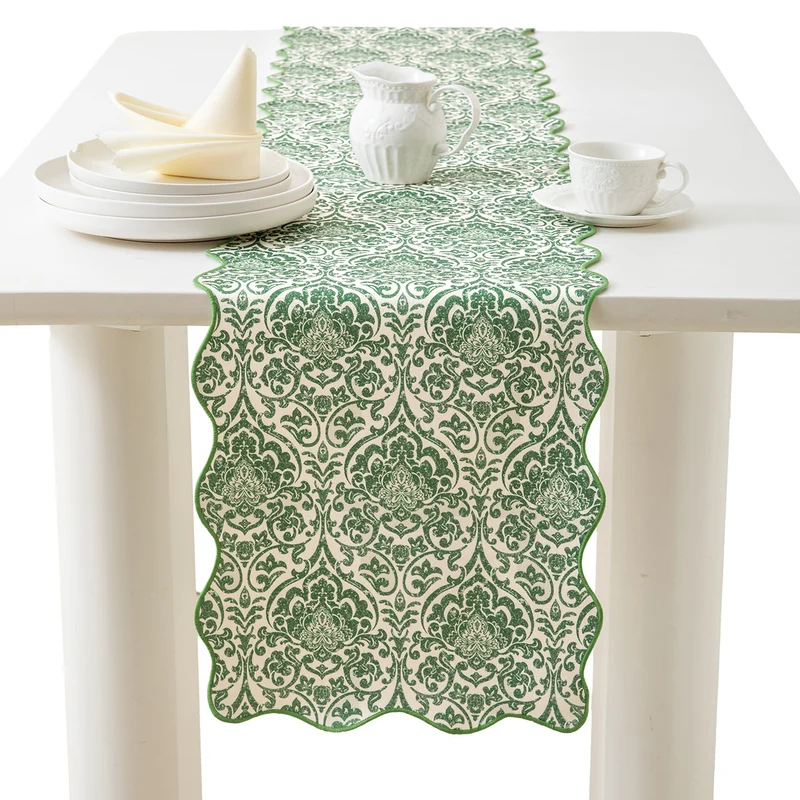Damask-style table runner with curved wave edge and fine ornamental print Stornfield