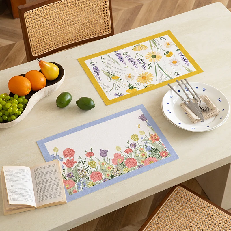 Printed rectangular placemat made of cotton blend with floral illustration print and contrast border Stornfield