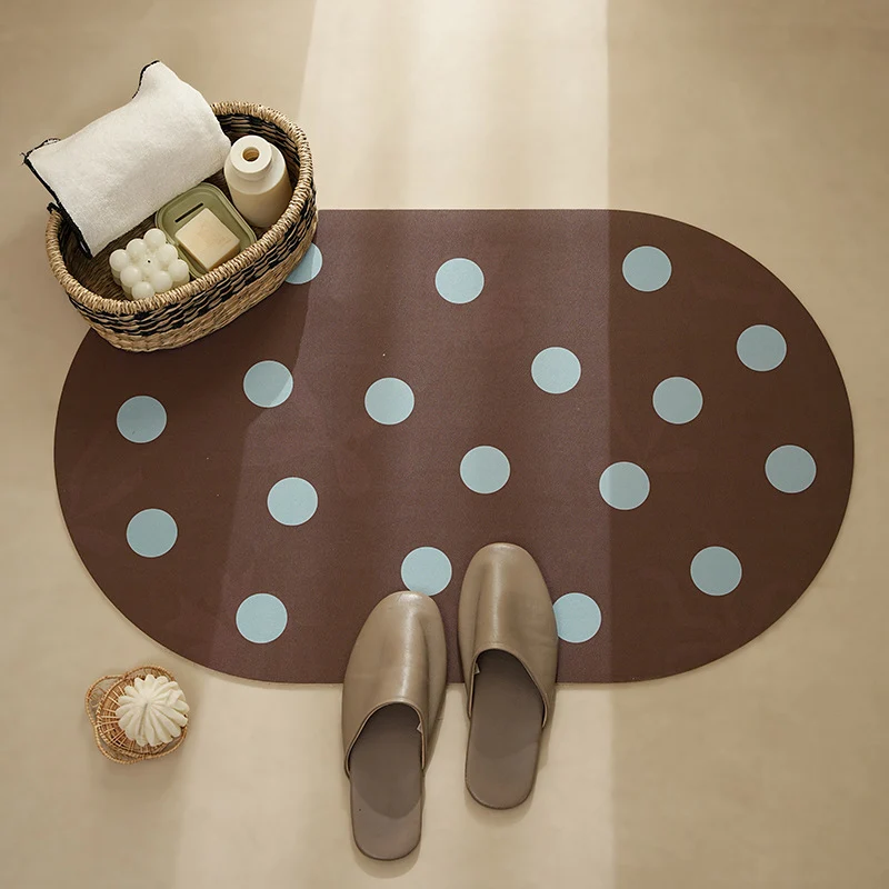 Wipeable placemat made of PVC with large polka dot pattern and non-slip backing Stornfield