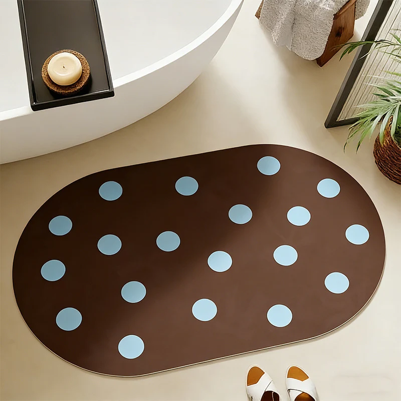 Wipeable placemat made of PVC with large polka dot pattern and non-slip backing Stornfield
