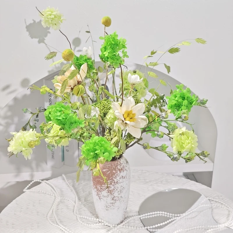 Lively Floral Arrangement in Decorative Ceramic Vase