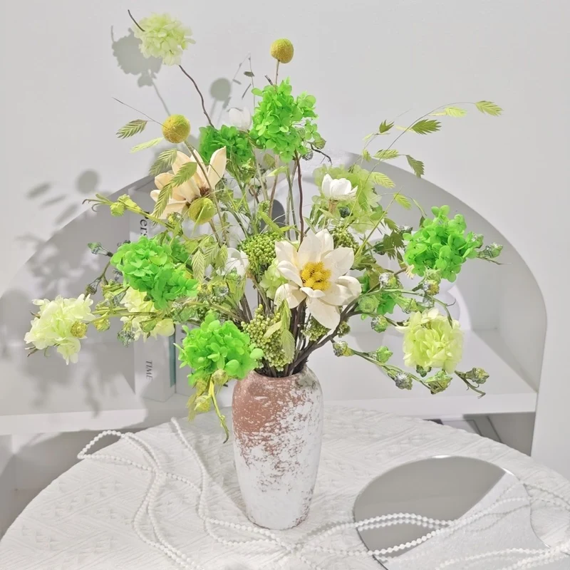 Lively Floral Arrangement in Decorative Ceramic Vase