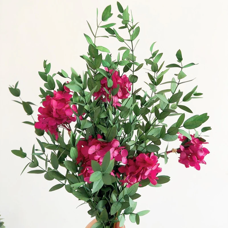 Lifelike Floral Bouquet with Green Foliage