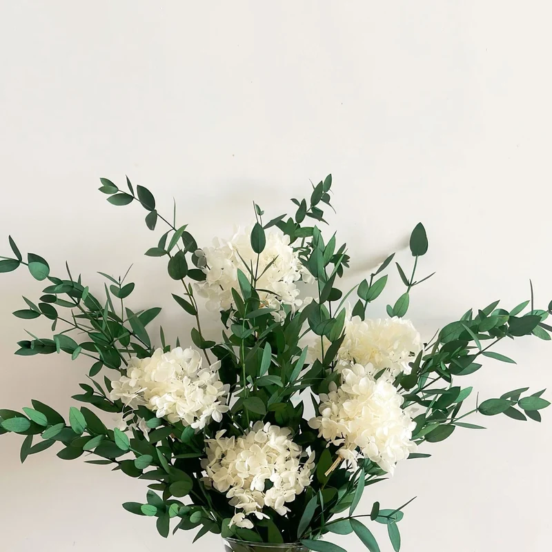 Lifelike Floral Bouquet with Green Foliage
