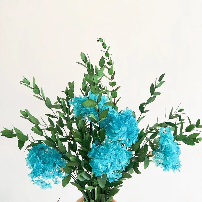 Lifelike Floral Bouquet with Green Foliage