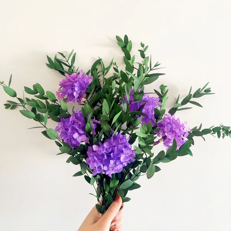 Lifelike Floral Bouquet with Green Foliage