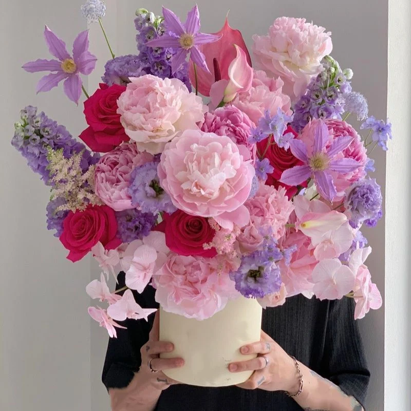 Decorative Floral Arrangement with Stylish Vase