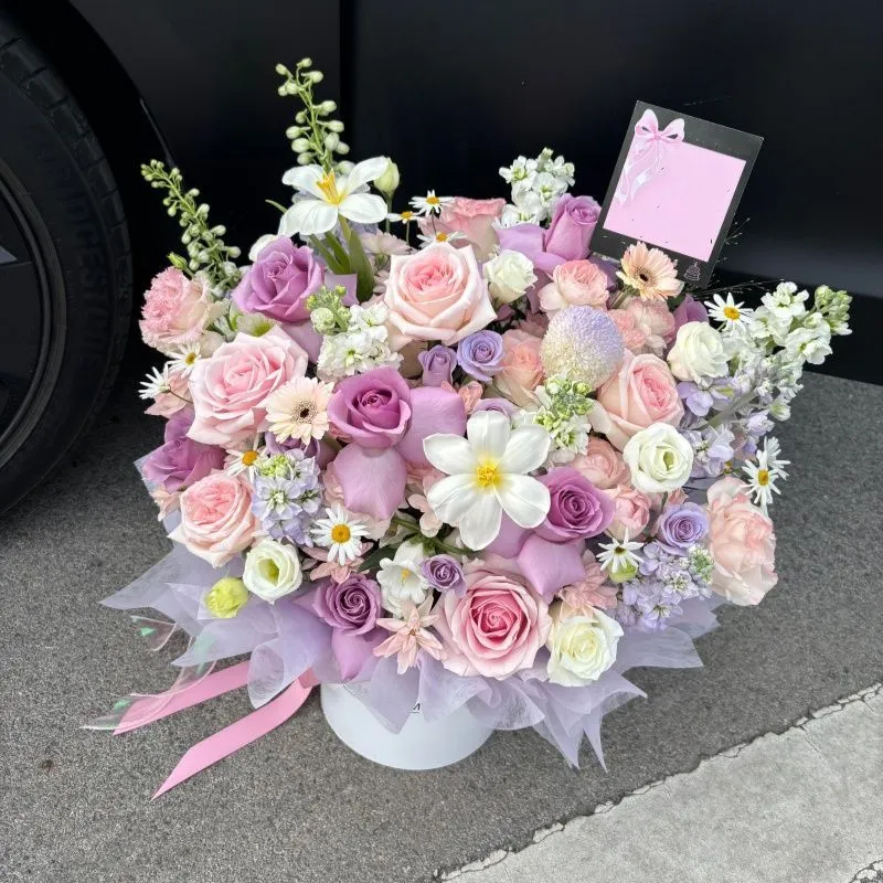 Decorative Floral Arrangement with Stylish Vase