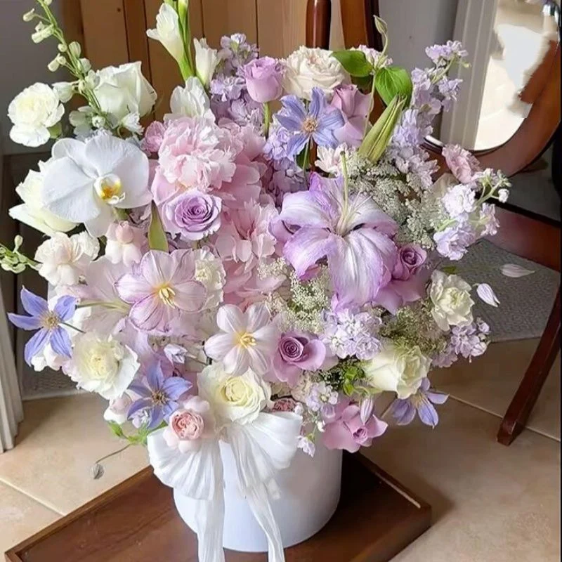 Decorative Floral Arrangement with Stylish Vase